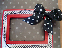 picture frame with black and white ribbon